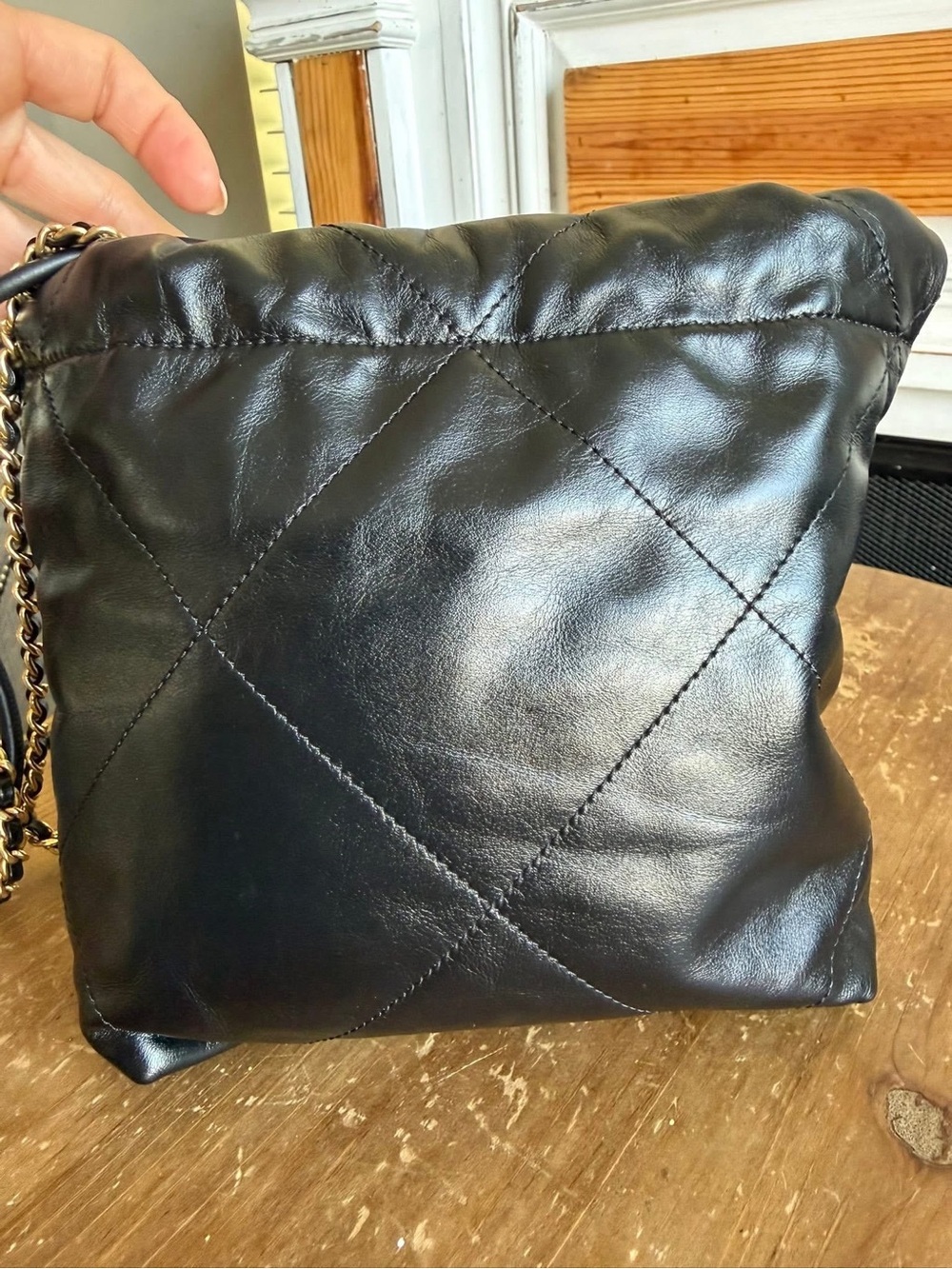 CHANEL Black Quilted Leather Mini Drawstring Bag with Gold Hardware - Picture 4 of 9